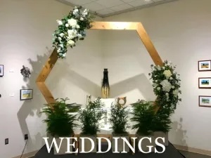 Backdrop with greenery for Facility Rental page